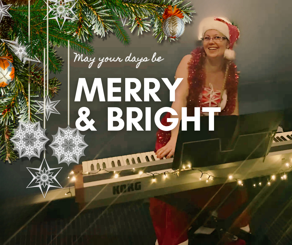 Christmas card saying: may your days be merry and bright. In background Jenni playing the piano with Christmas dress on.